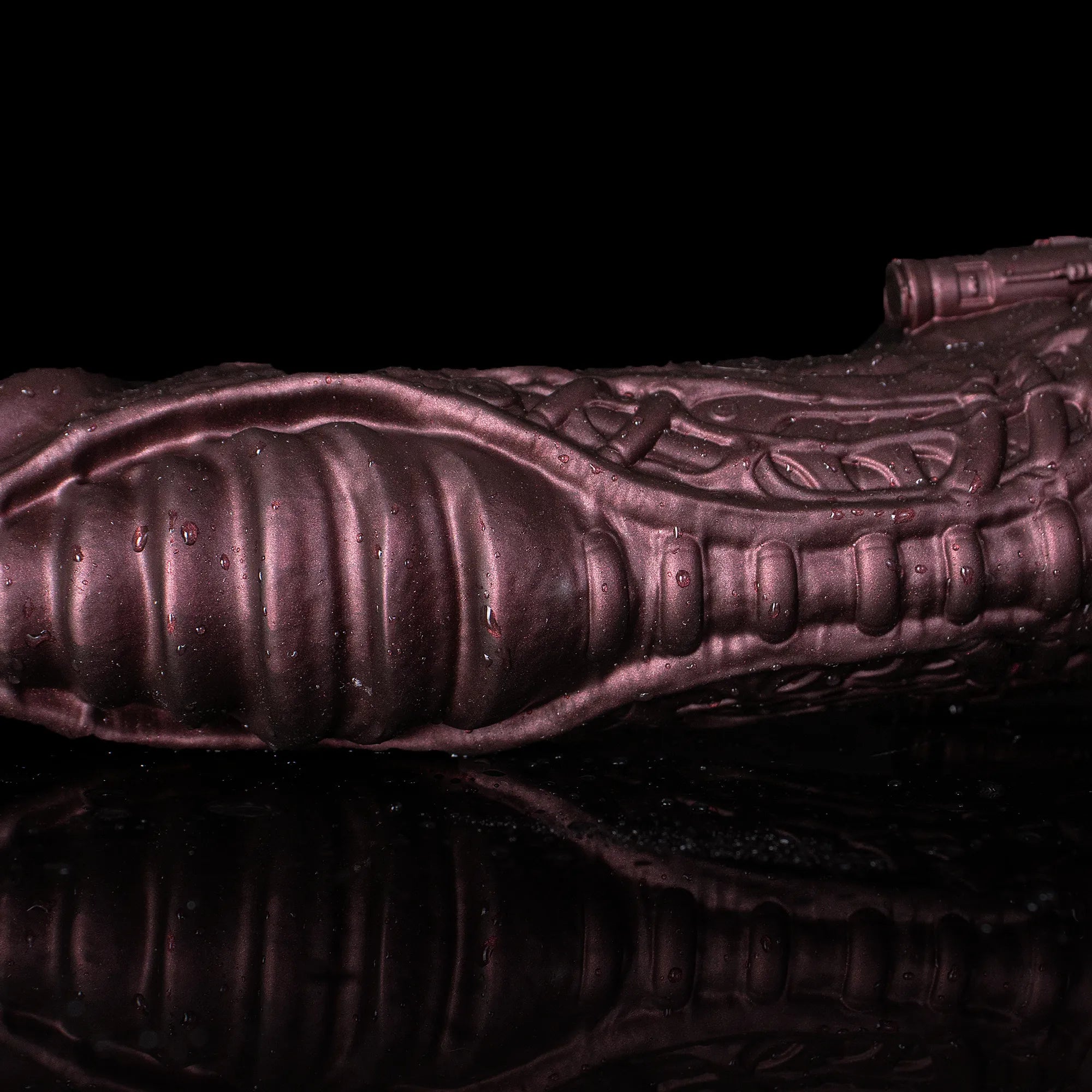 Oieffur Cyberpunk sheath male extender sleeve with mechanical real feel design, close-up view showing textured surface and snug fit.