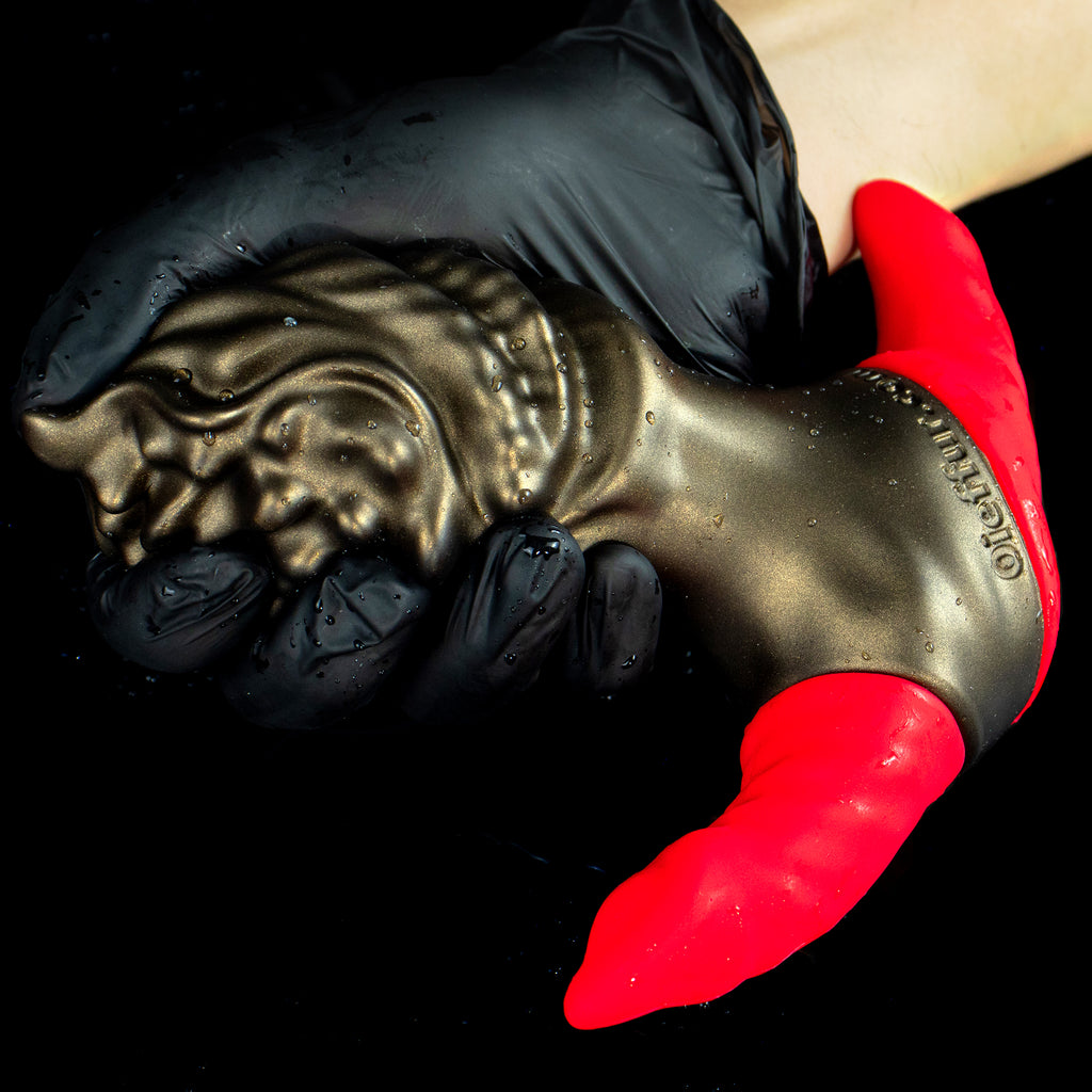 Oieffur Milking Fruit II Anal Plug with soft sleeve and hard core, showing detailed silicone design and textured surface.