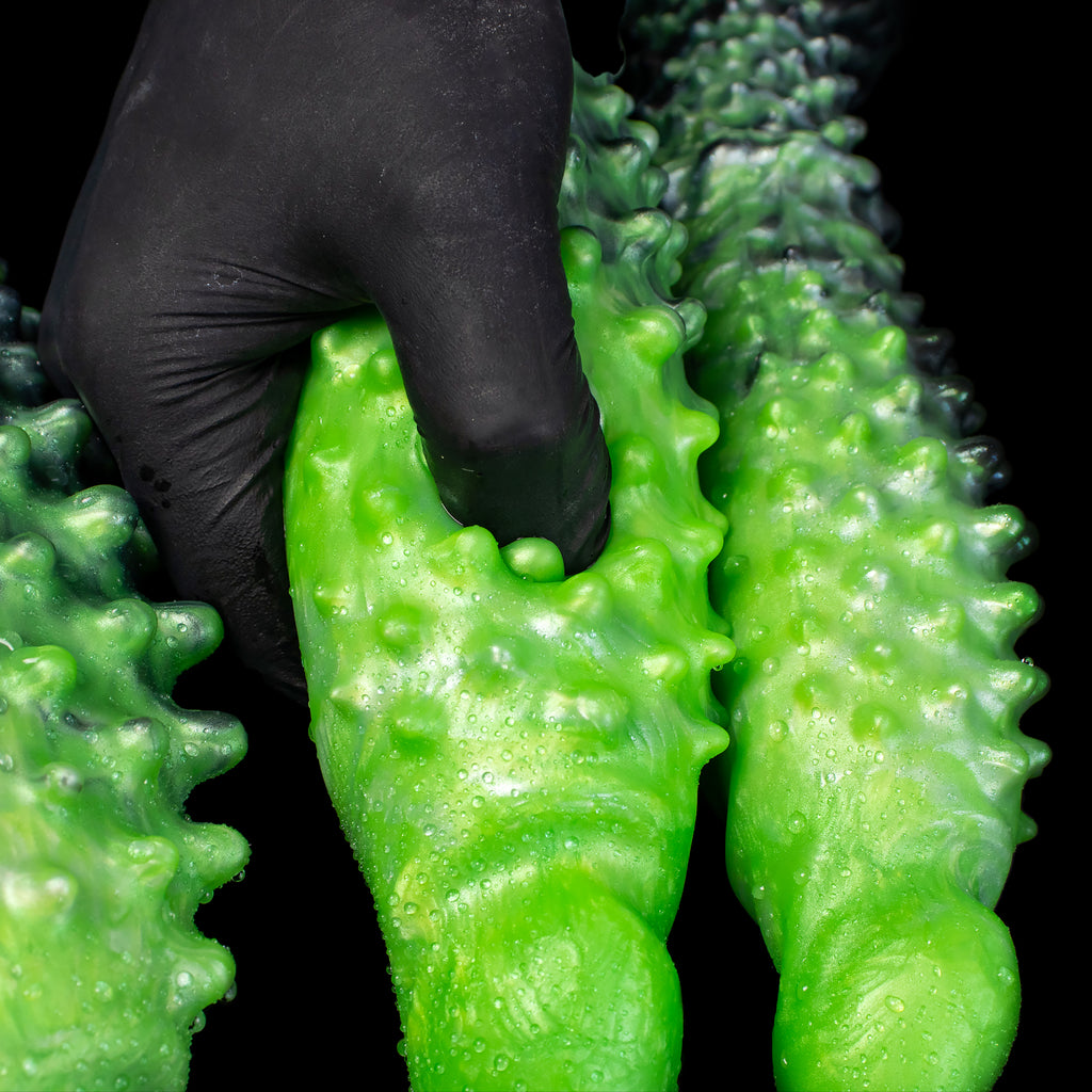 Black "Abyss" spiked dildo from Oieffur, made of platinum silicone, featuring a textured surface and realistic design for fantasy pleasure.