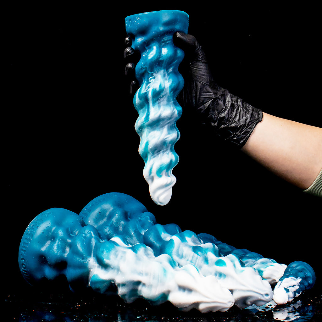 Oieffur Thick Conqueror Platinum silicone dildo with tapered design, realistic shape, and smooth surface for fantasy play.