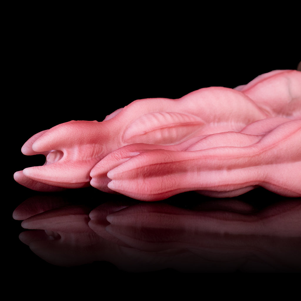 Oieffur Nagaros Feathered Serpent God platinum silicone fantasy dildo with detailed serpent design and feathered accents.