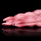 Oieffur Nagaros Feathered Serpent God platinum silicone fantasy dildo with detailed serpent design and feathered accents.