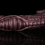 Oieffur Cyberpunk sheath male extender sleeve with mechanical real feel design, close-up view showing textured surface and snug fit.