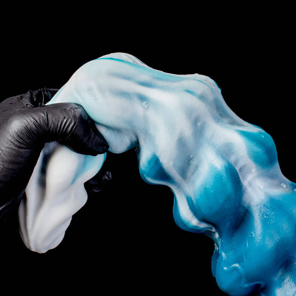 Oieffur Thick Conqueror Platinum silicone fantasy dildo with tapered design, showcasing smooth, realistic curves for intimate use.