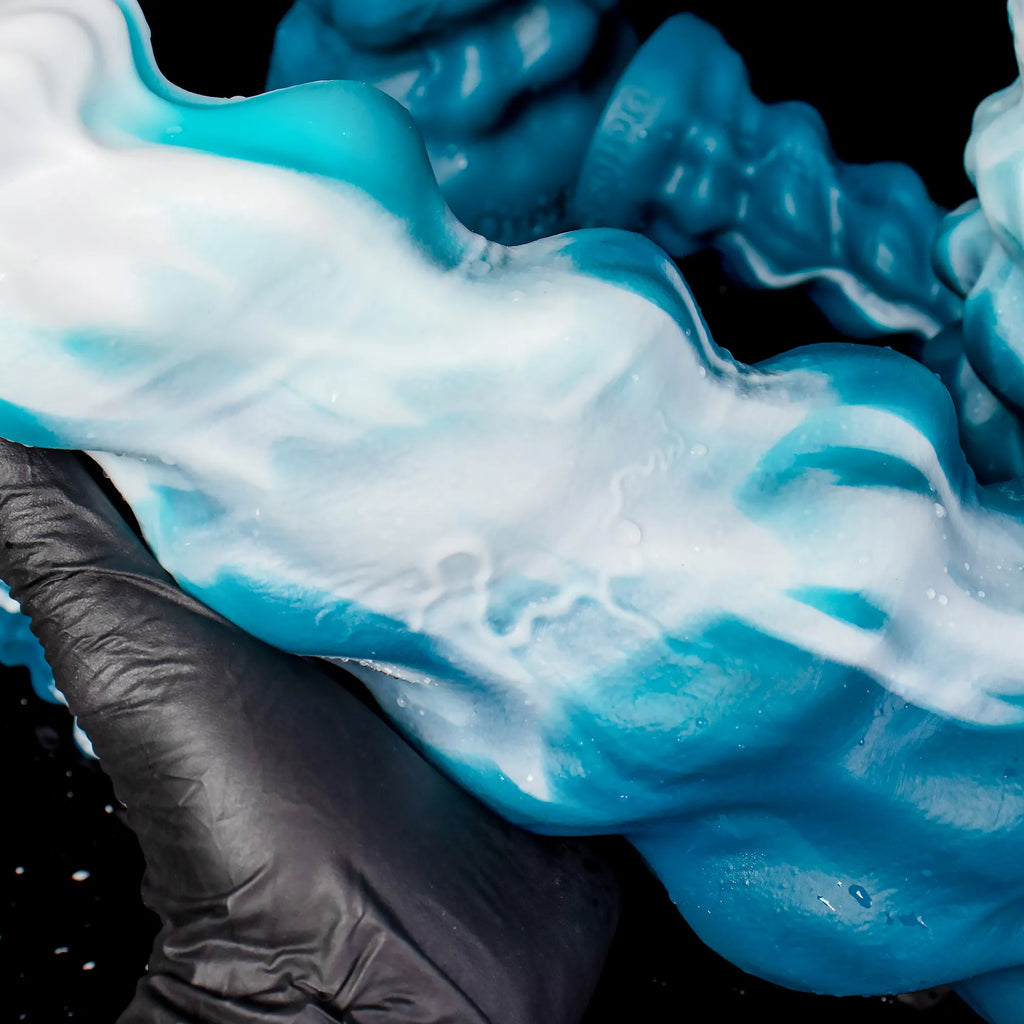 Oieffur Thick Conqueror Platinum silicone dildo with tapered design, featuring smooth, realistic texture for fantasy adult pleasure.