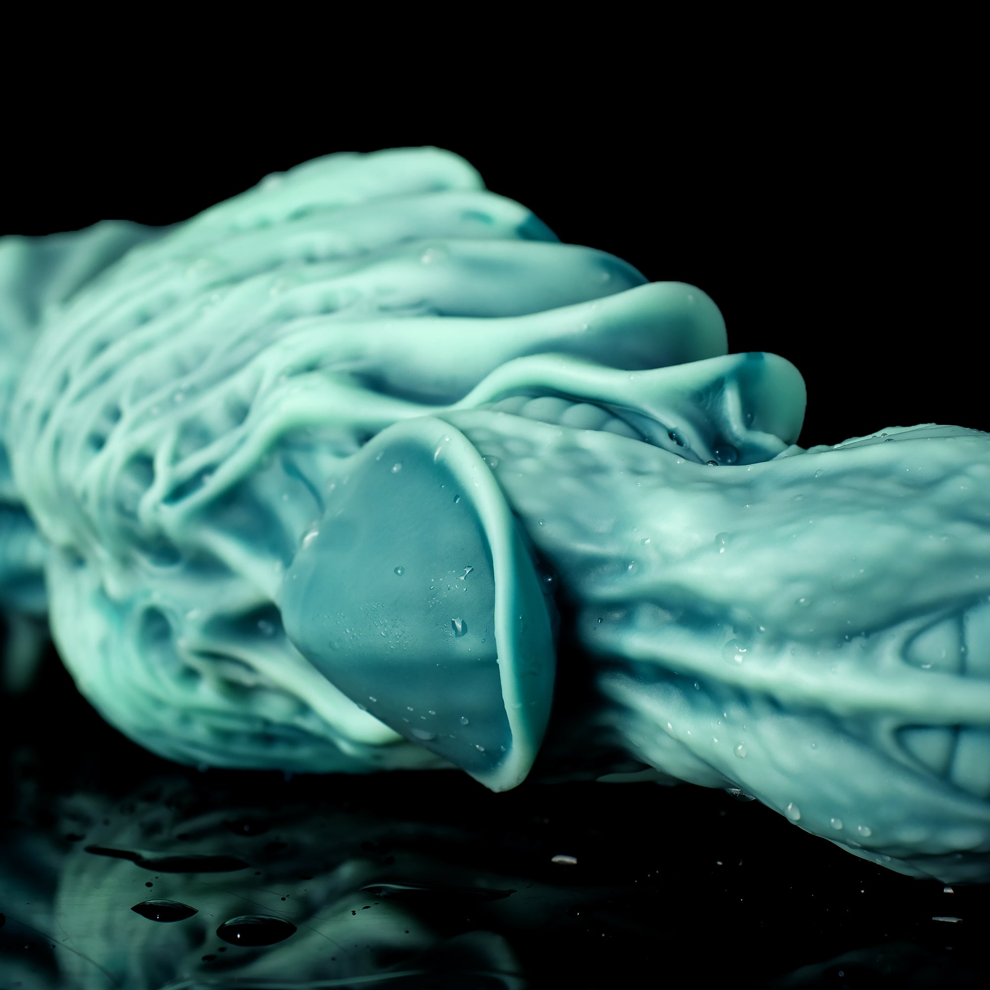 Oieffur fantasy dildo with textured beads, curved design for enhanced pleasure, shown in detailed close-up image.