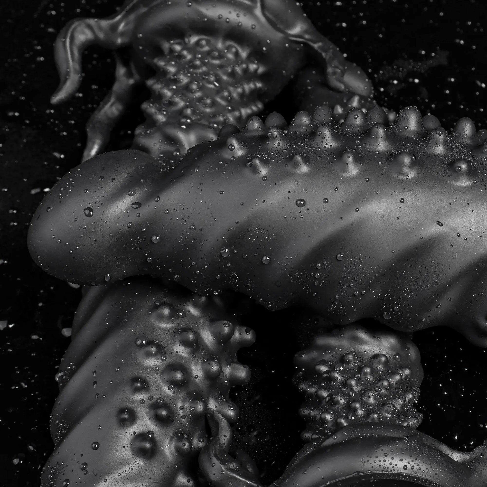 Black Abyss spiked dildo from Oieffur's Fantasy Dildos collection, made of platinum silicone, featuring a textured, monster design.