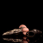 Realistic dog penis sleeve made of platinum silicone, designed as a canine cock extender for enhanced size and stimulation.